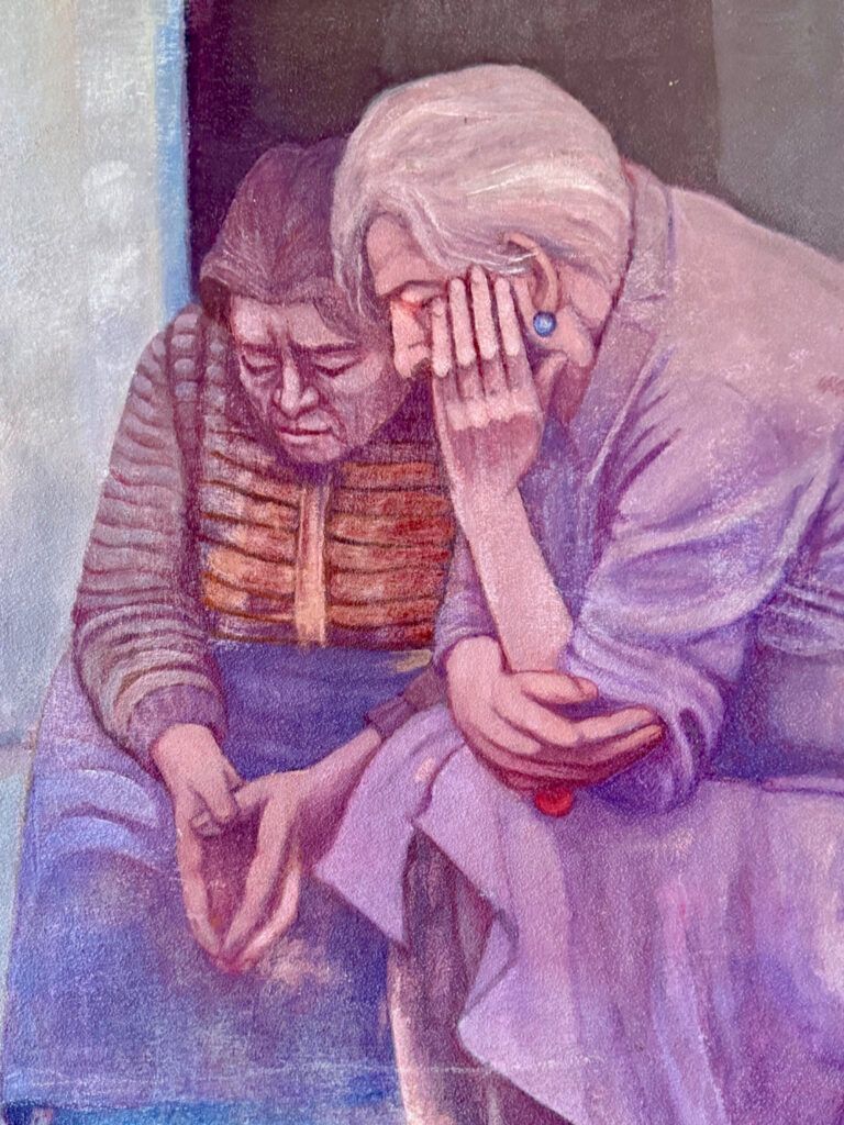 street art mural of two sad women