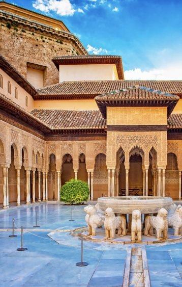 GRANADA, SPAIN - 14 MAY, 2018: The famous Lion Fountain in Alhambra palace in Granada, Spain on 14 May 2018. It is a palace and fortress complex located in Granada